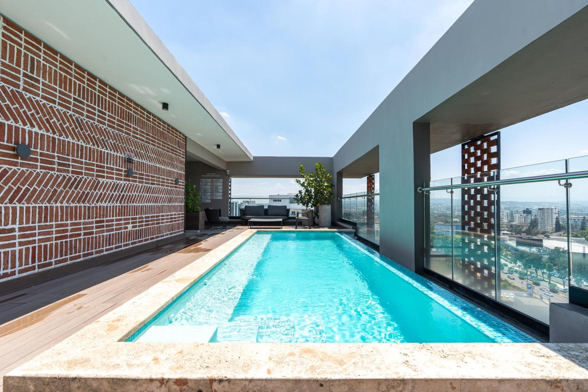 Modern Luxury Condo With Rooftop Pool & Gym ซานติอาโก เด ลอสกาบาเญโรส ภายนอก รูปภาพ